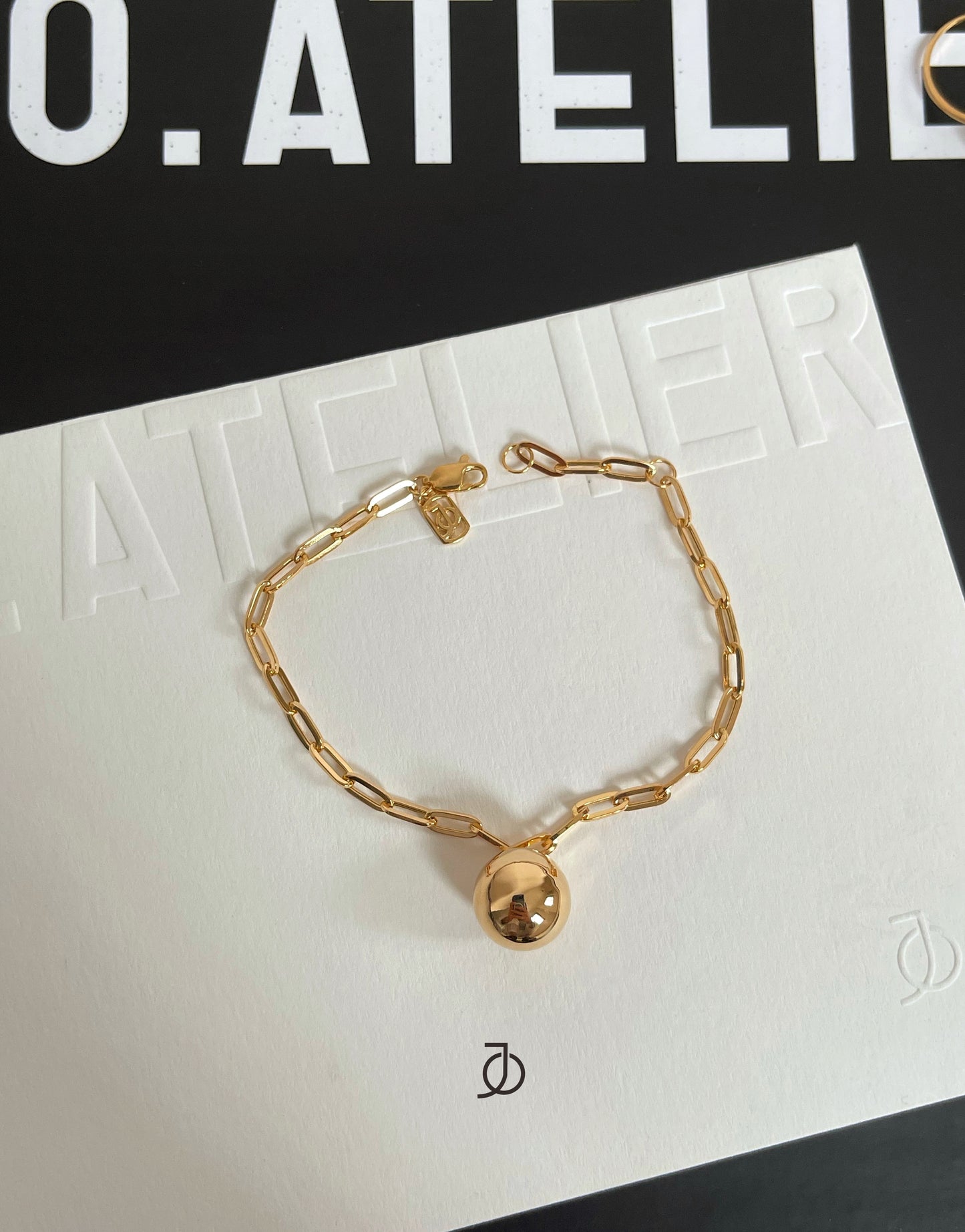JO DROP BALL DANGLE BRACELET WITH PAPER CLIP