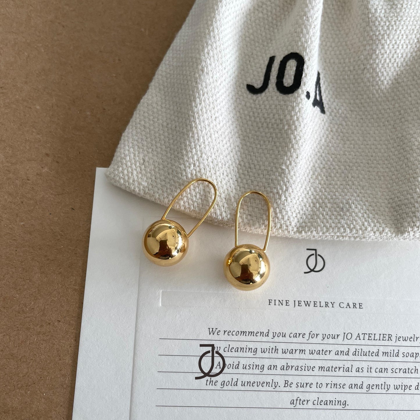JO Gold Ball Safety Pin Earring 17k