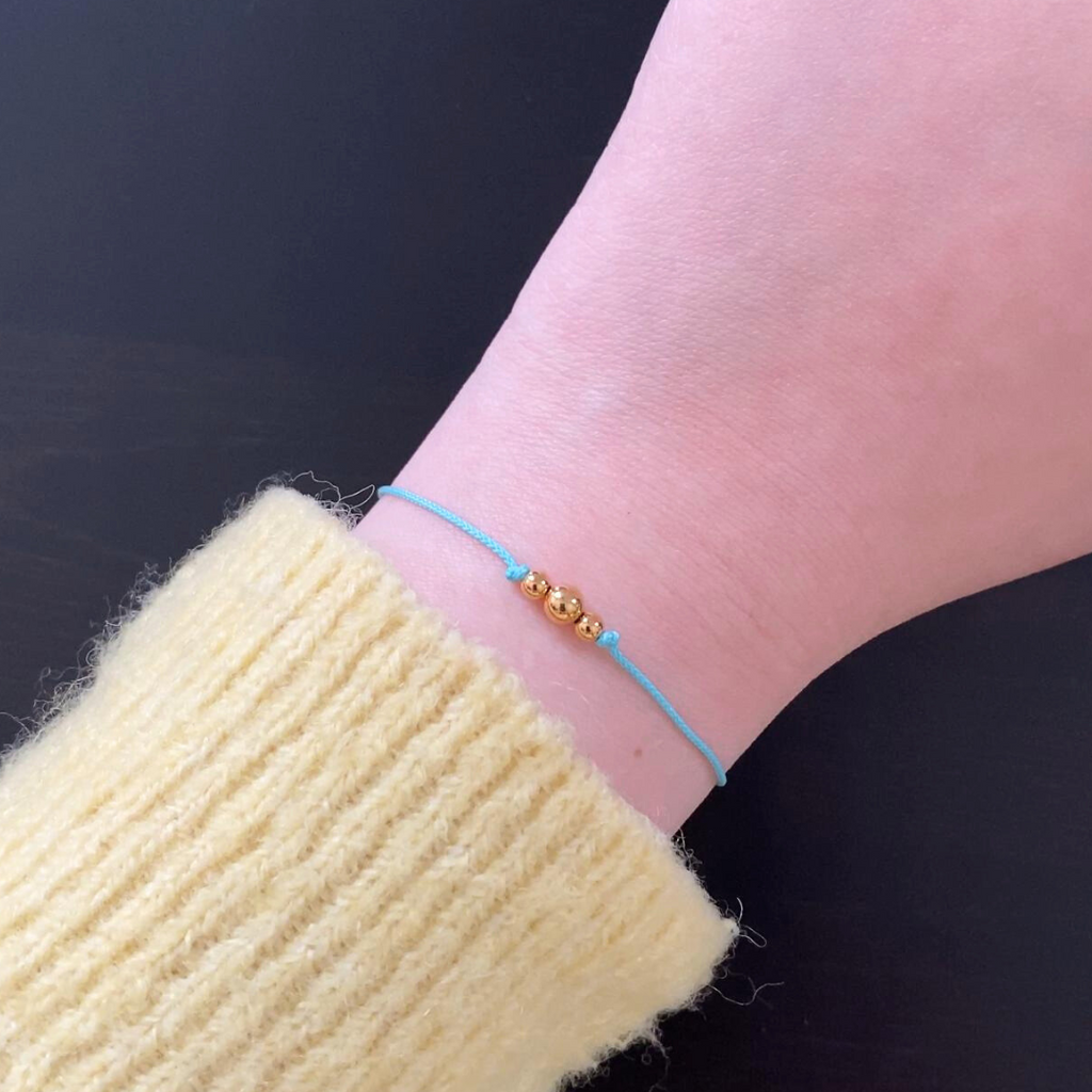 JO Graduated Gold Beads On Silk Cord Bracelet
