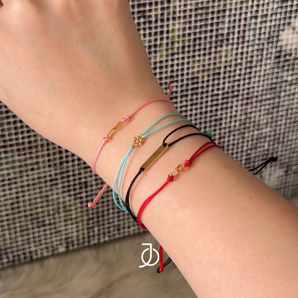 JO Interlocking Heart On Cord Bracelet